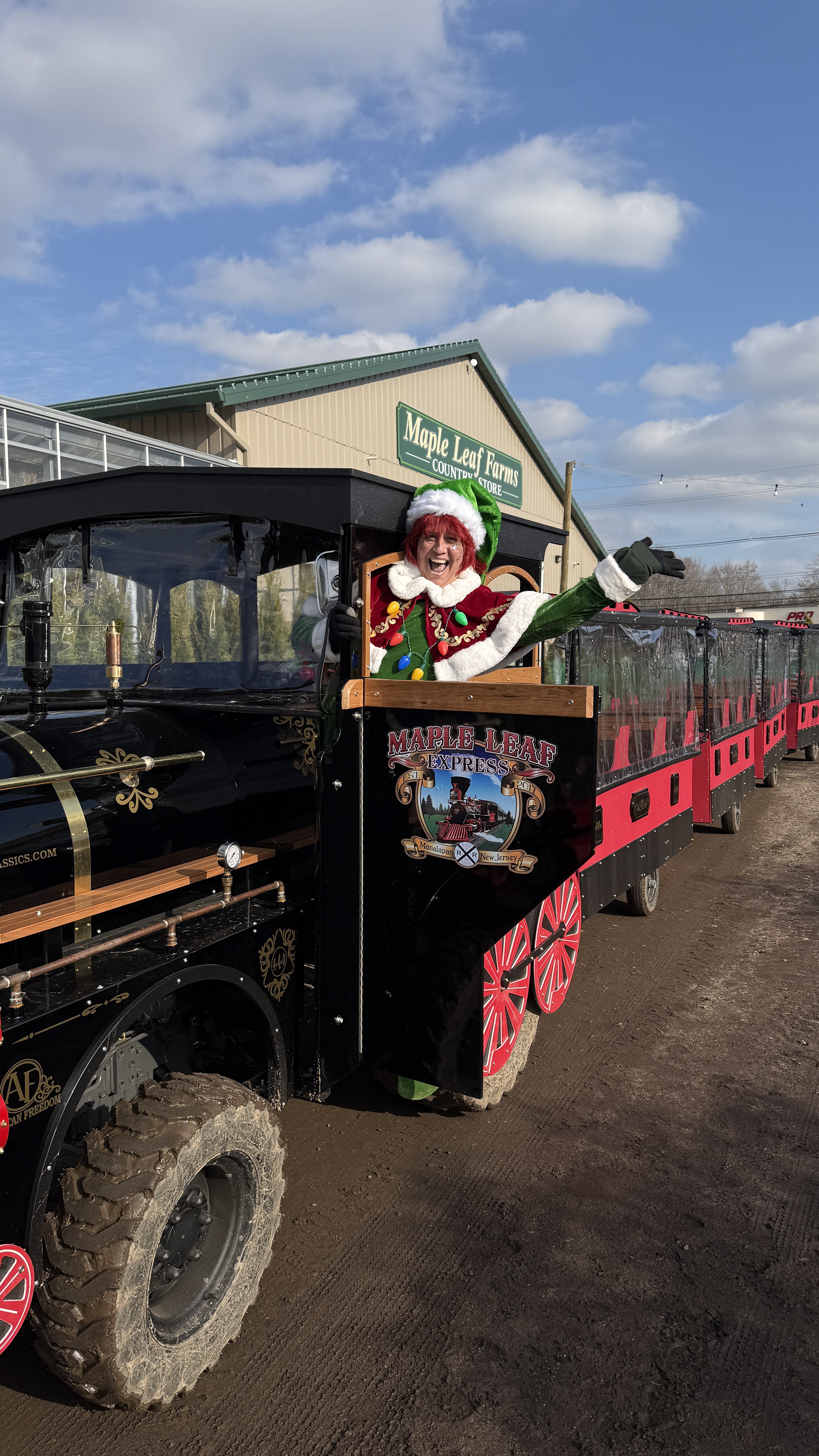 An elf welcoming visitors aboard the real Maple Leaf Express